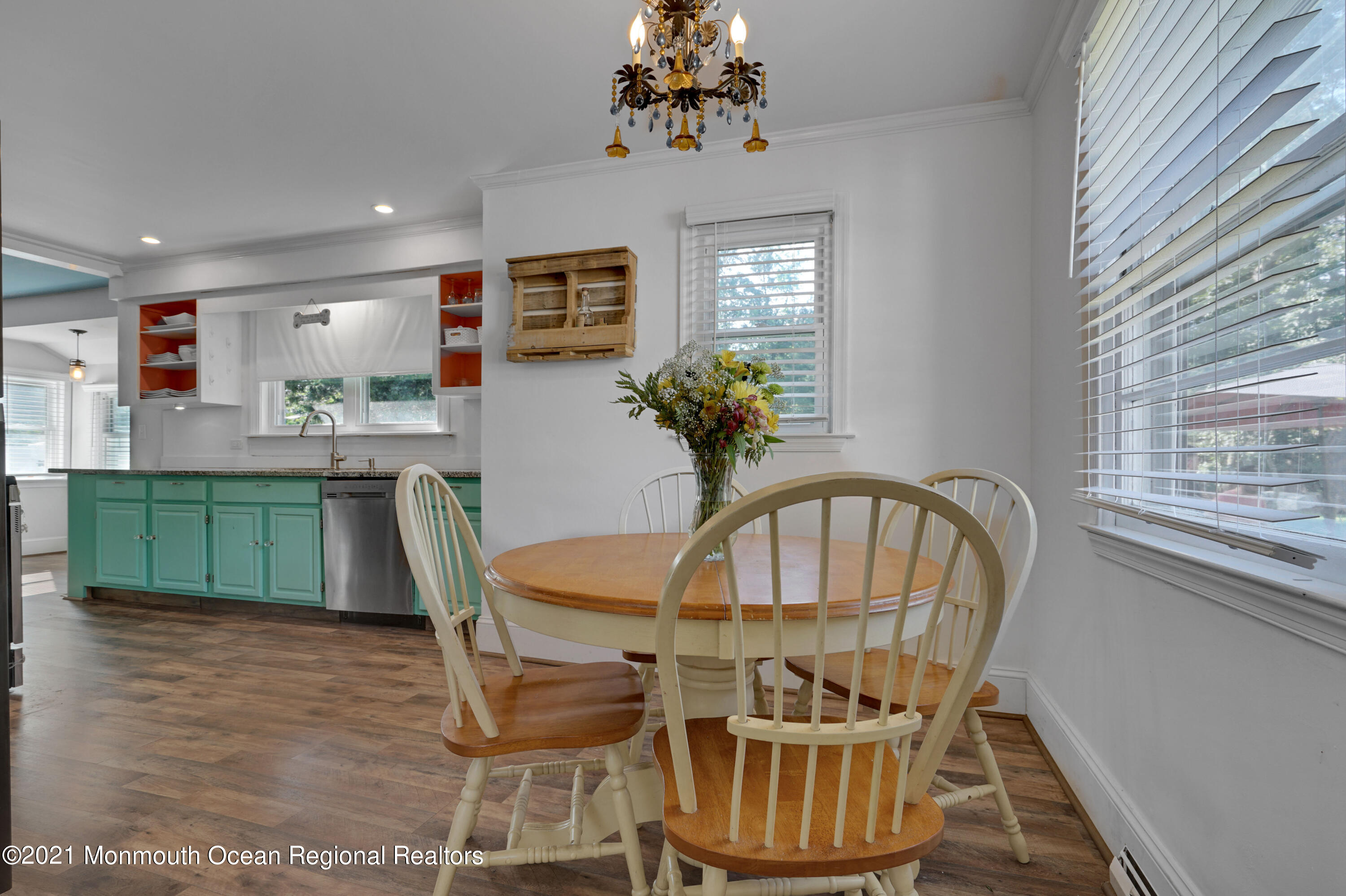 346 Cherry Quay Road Brick, NJ 08723 - Photo 15 of 27 a view of a dining room with furniture and a potted plant