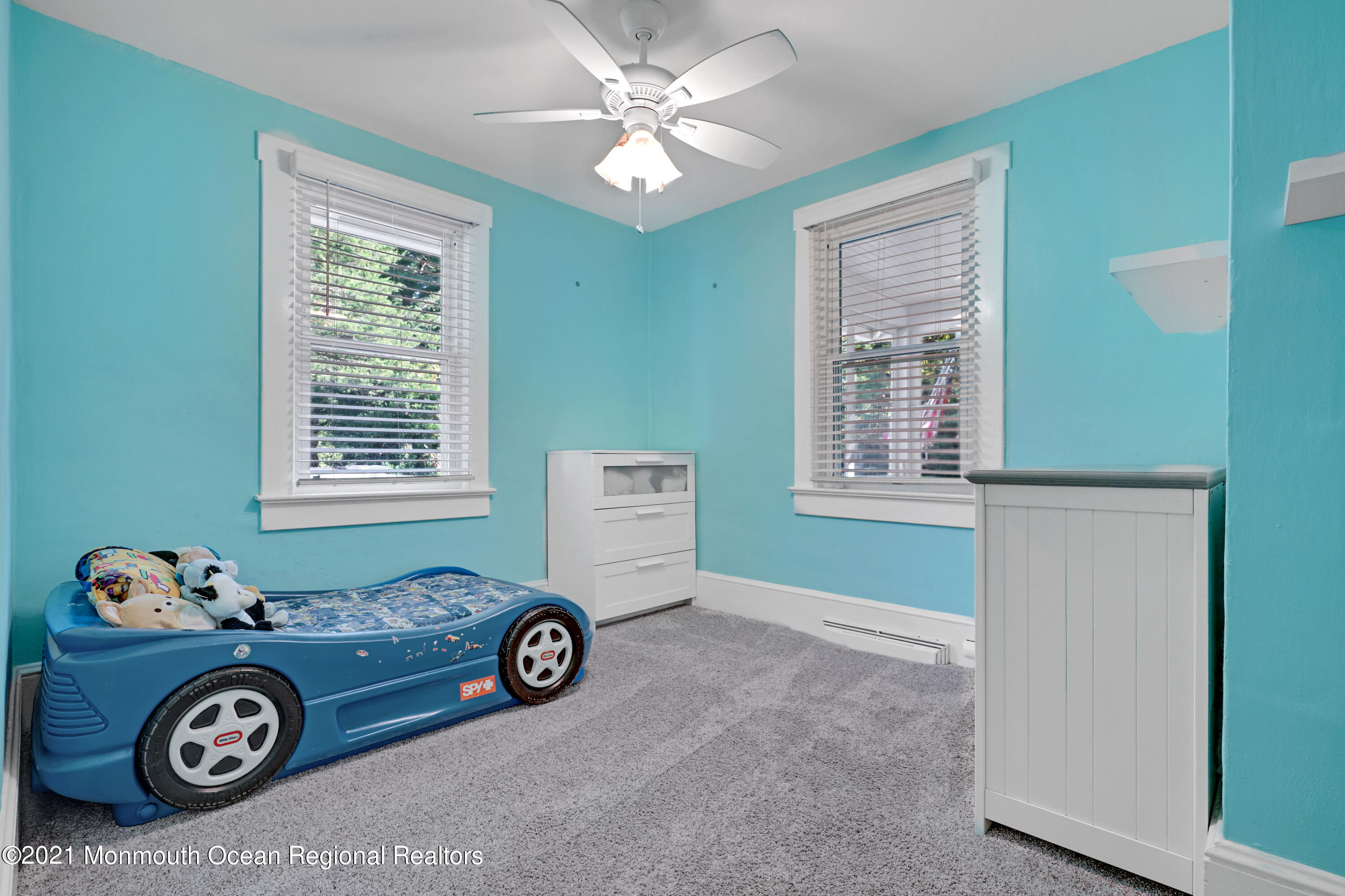 346 Cherry Quay Road Brick, NJ 08723 - Photo 16 of 27 a view of a livingroom with a car parked in it