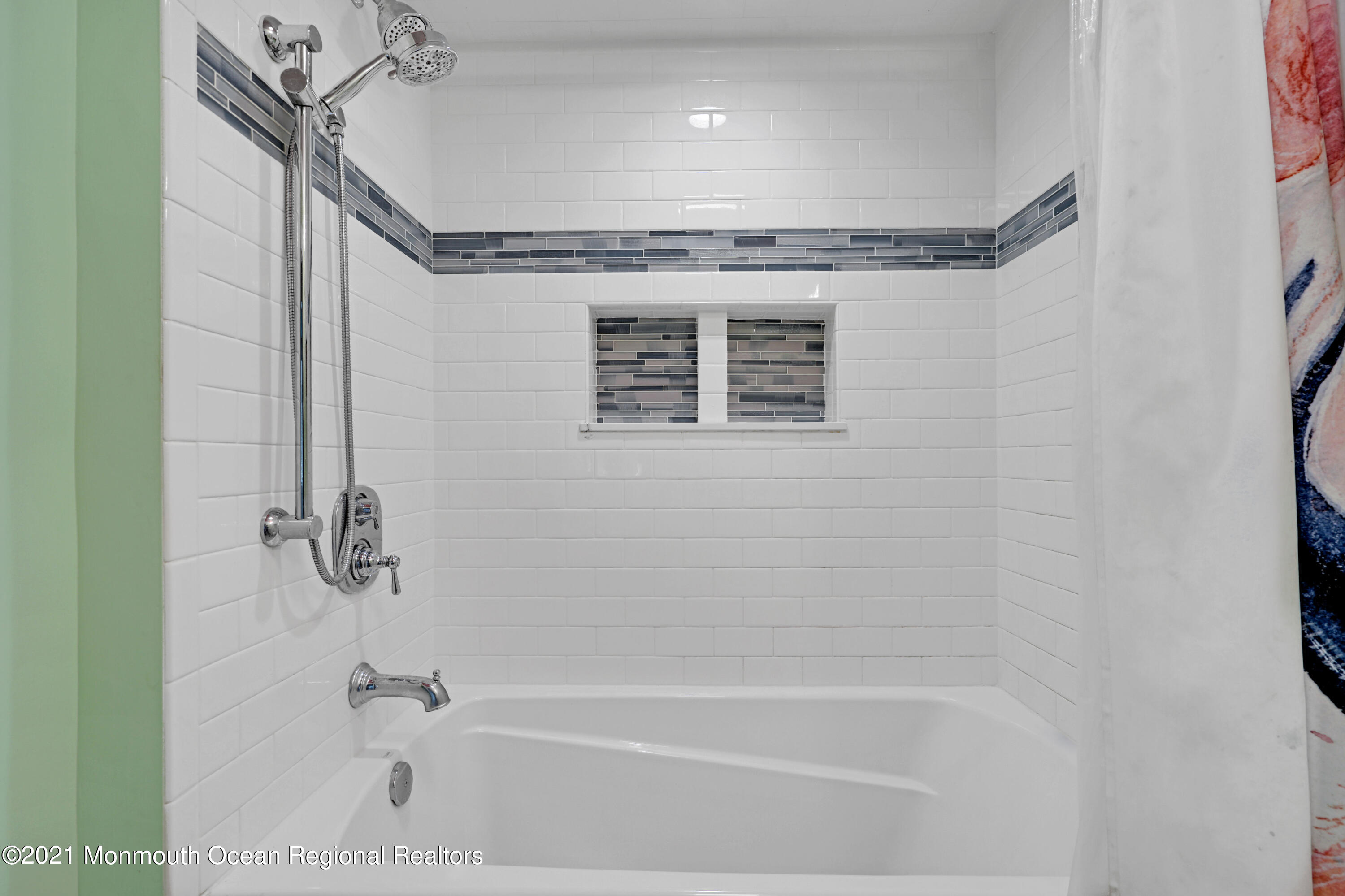 346 Cherry Quay Road Brick, NJ 08723 - Photo 18 of 27 a bathroom with a tub and a shower