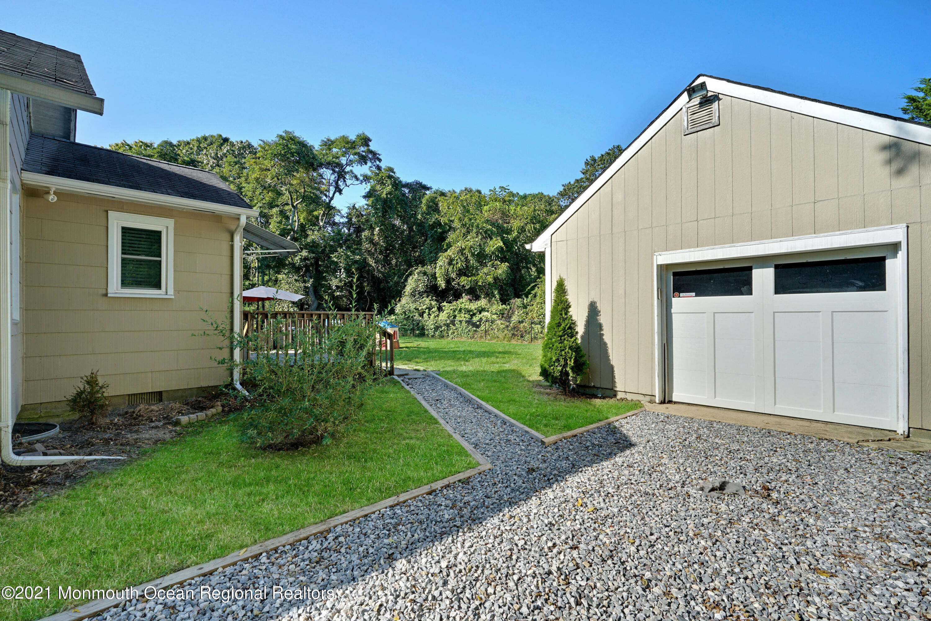 346 Cherry Quay Road Brick, NJ 08723 - Photo 24 of 27 a view of a back yard of the house