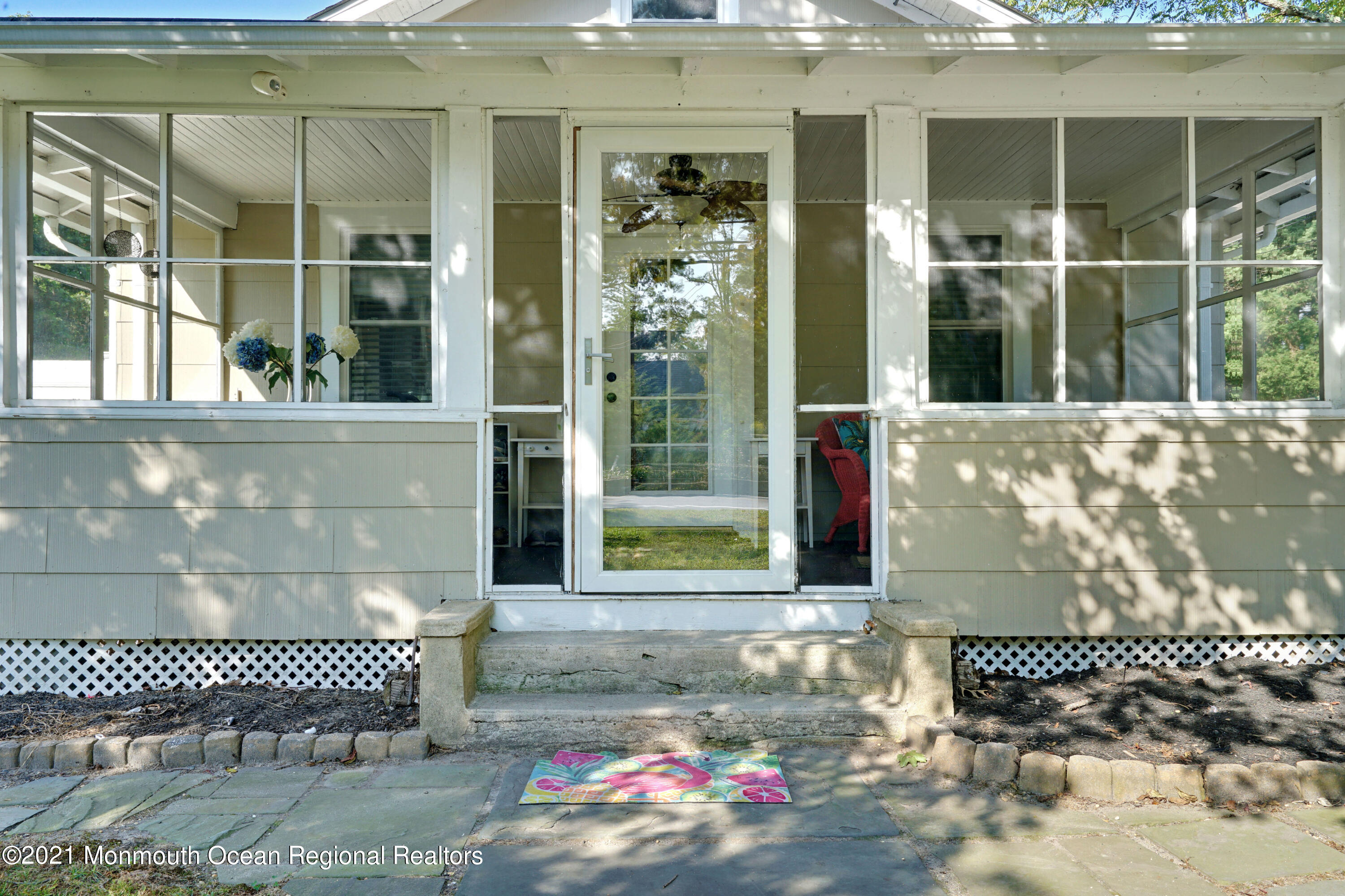 346 Cherry Quay Road Brick, NJ 08723 - Photo 5 of 27 a front view of a house with a large window
