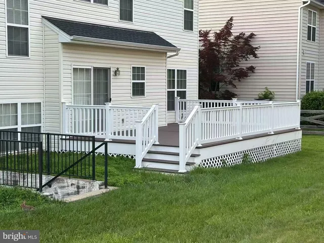 a view of a house with a deck