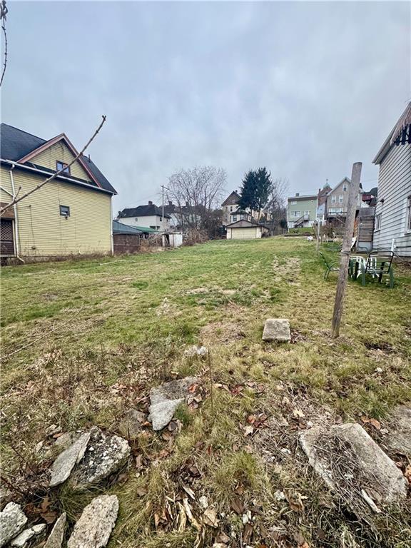 36 Schoonmaker Avenue Monessen, PA 15062 - Photo 3 of 3 a view of a house with a yard