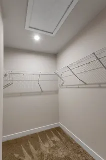 a view of a room with racks on the wall