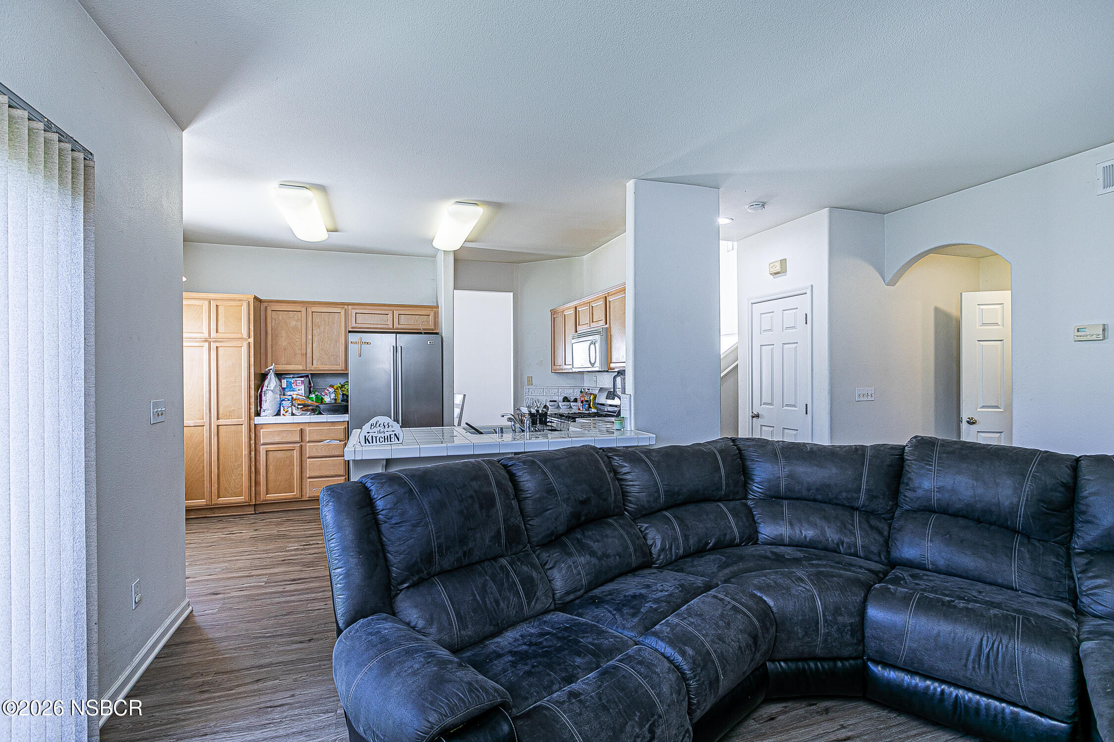 1838 Gable Lane Santa Maria, CA 93458 - Photo 11 of 31 a living room with furniture and a wooden floor