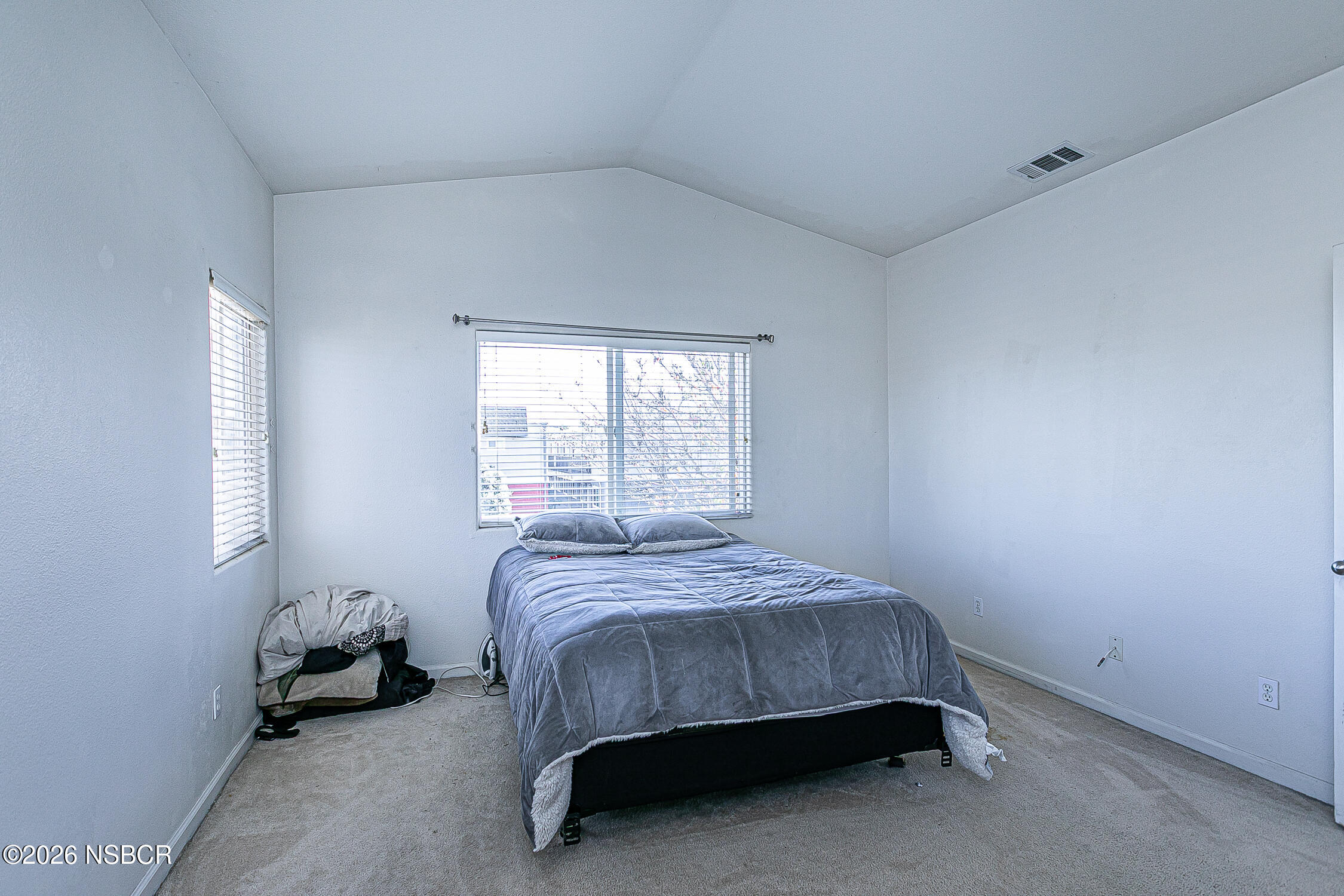 1838 Gable Lane Santa Maria, CA 93458 - Photo 18 of 31 a bed sitting in a bedroom next to a window