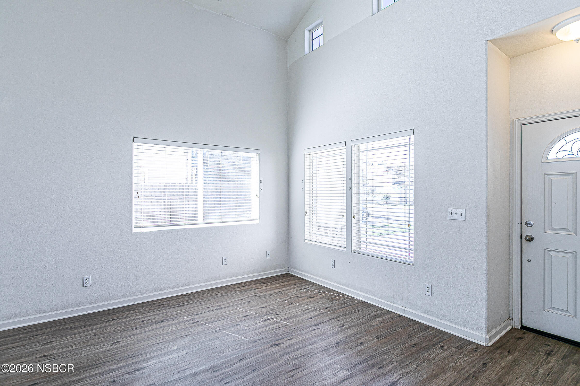 1838 Gable Lane Santa Maria, CA 93458 - Photo 2 of 31 an empty room with wooden floor and windows