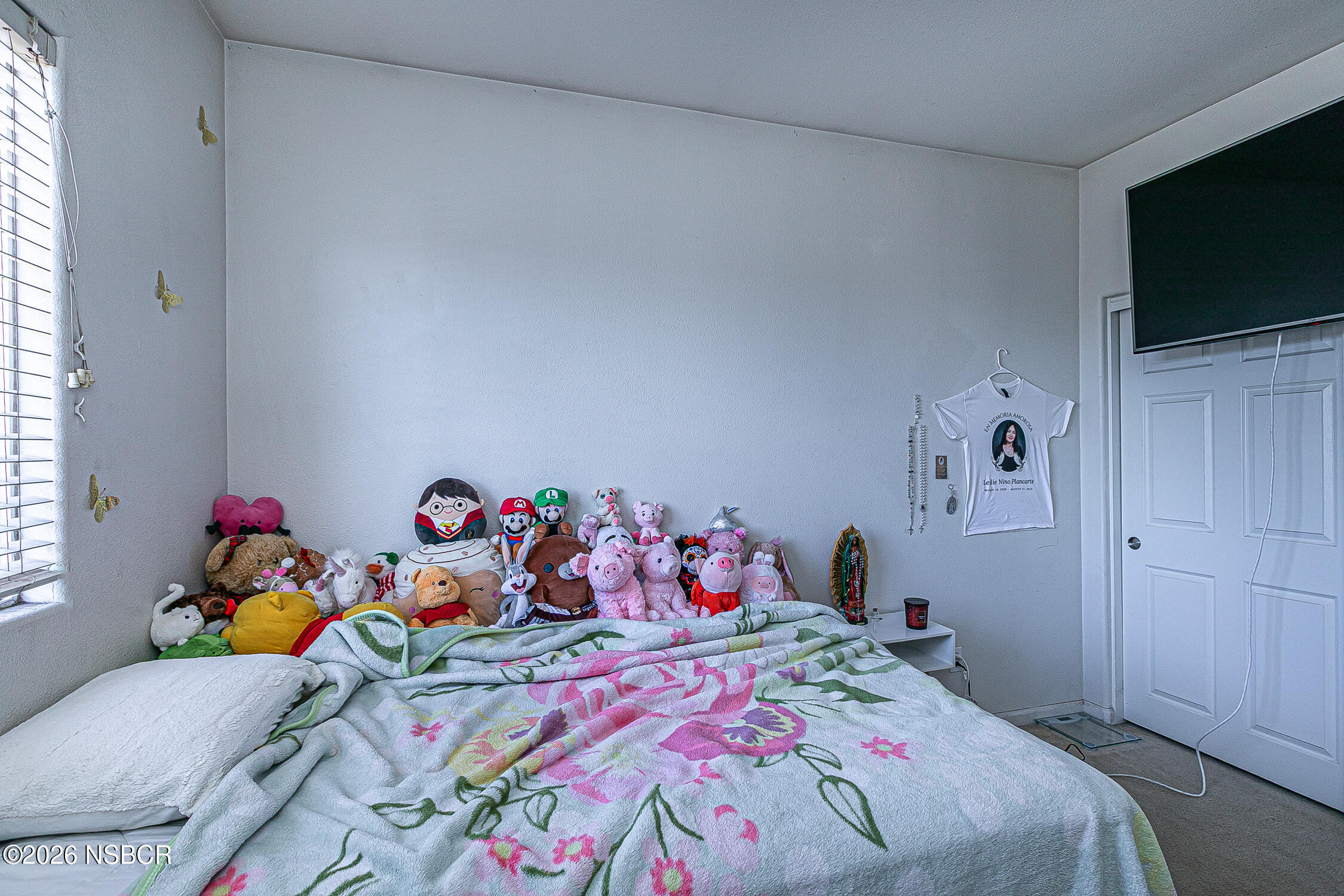 1838 Gable Lane Santa Maria, CA 93458 - Photo 23 of 31 a bedroom with a bed and a flat screen tv