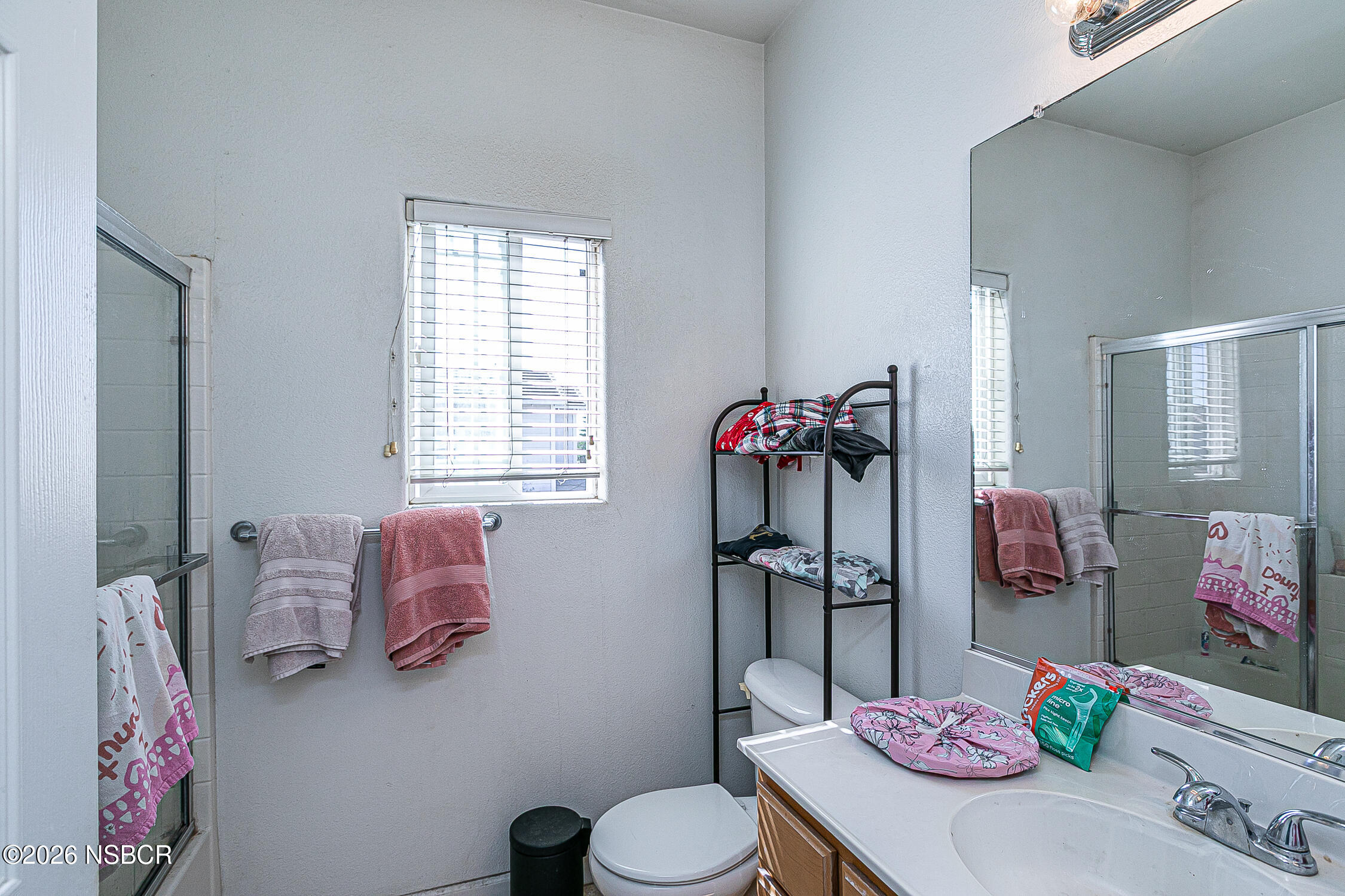1838 Gable Lane Santa Maria, CA 93458 - Photo 26 of 31 a bathroom with a sink toilet tub and shower