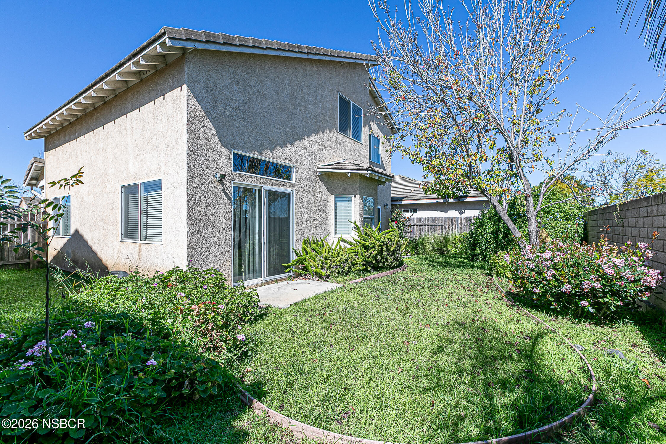 1838 Gable Lane Santa Maria, CA 93458 - Photo 29 of 31 a front view of a house with a garden