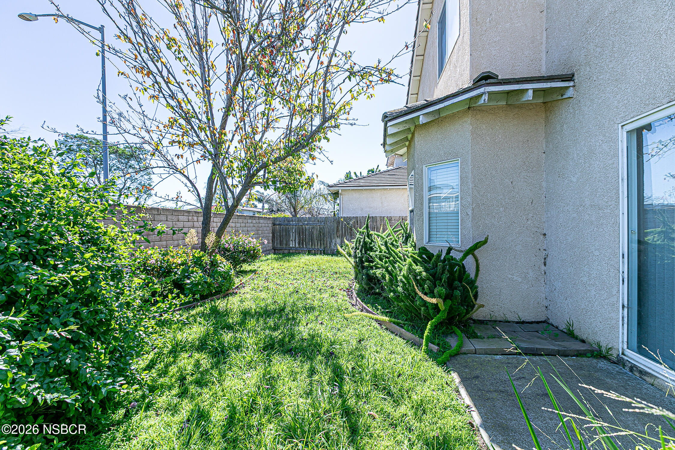 1838 Gable Lane Santa Maria, CA 93458 - Photo 30 of 31 a view of a house with a yard