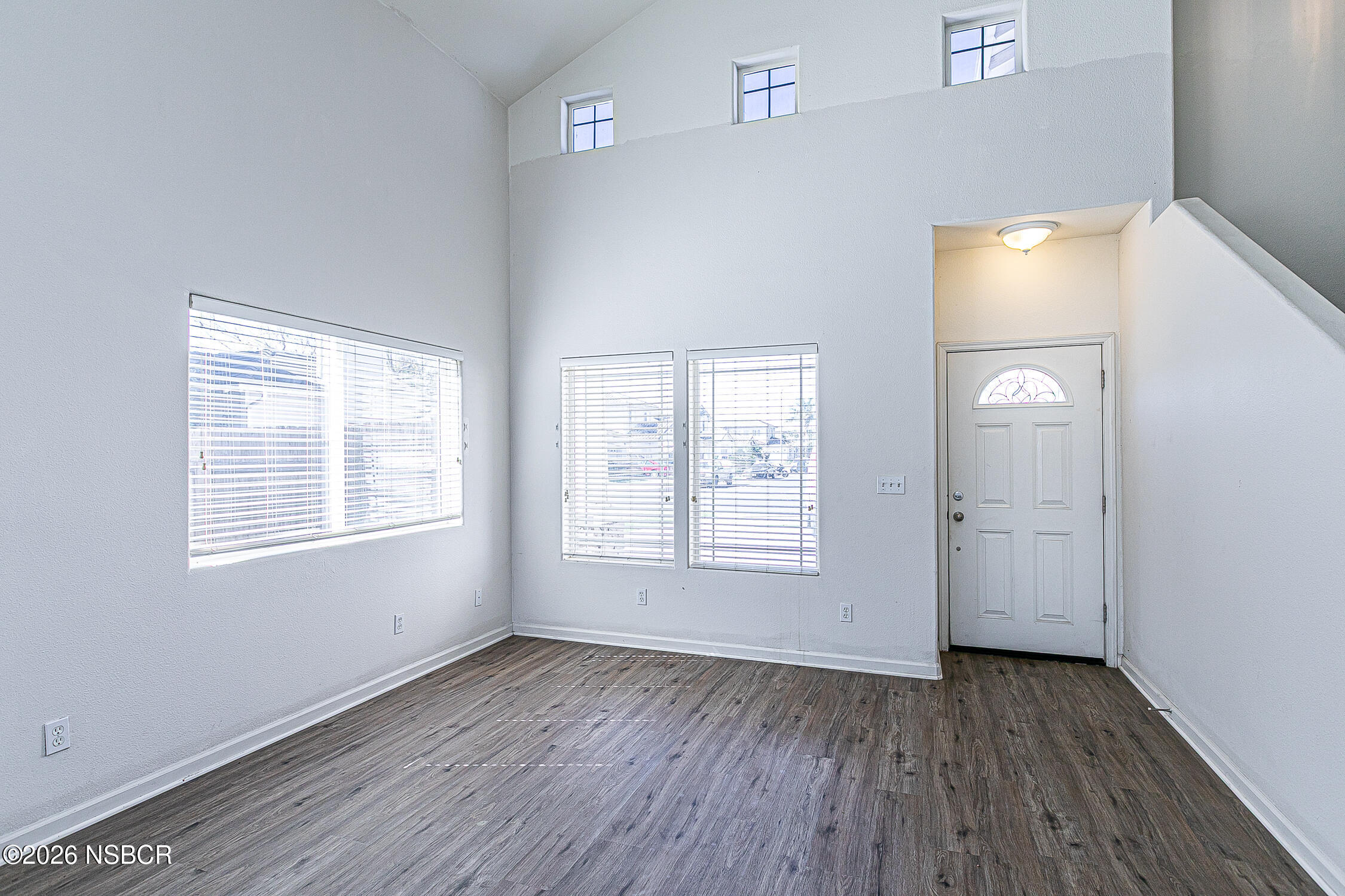 1838 Gable Lane Santa Maria, CA 93458 - Photo 3 of 31 an empty room with wooden floor and windows
