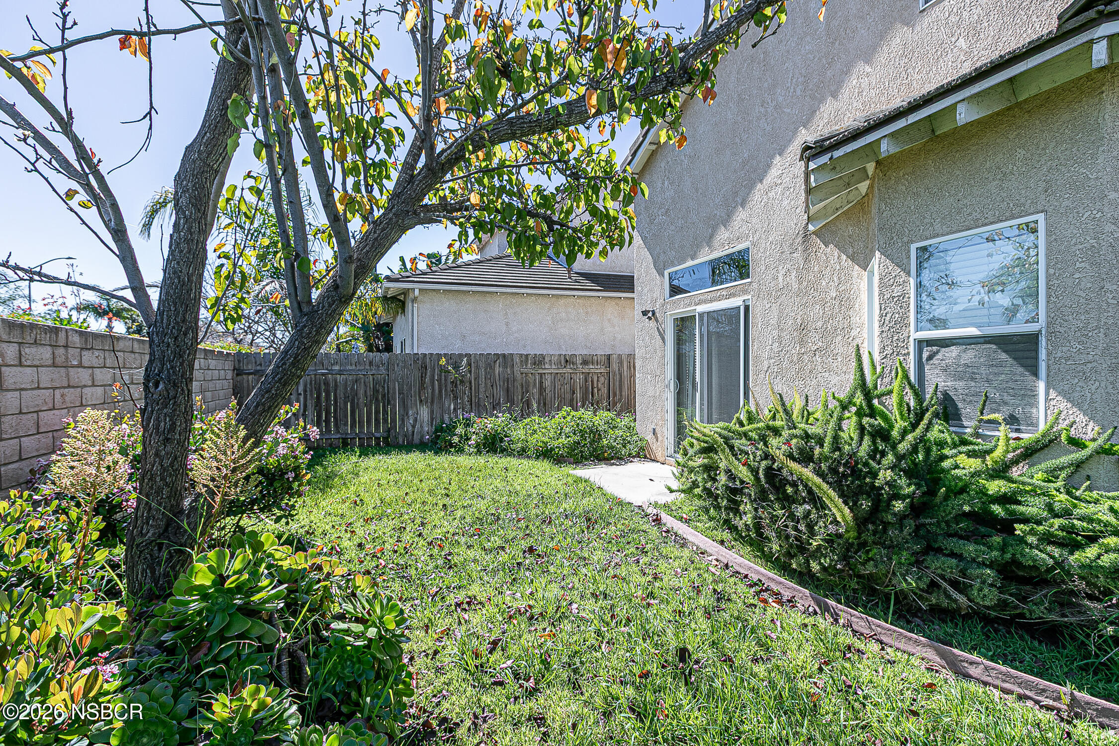 1838 Gable Lane Santa Maria, CA 93458 - Photo 31 of 31 a view of a house with a tree and plants