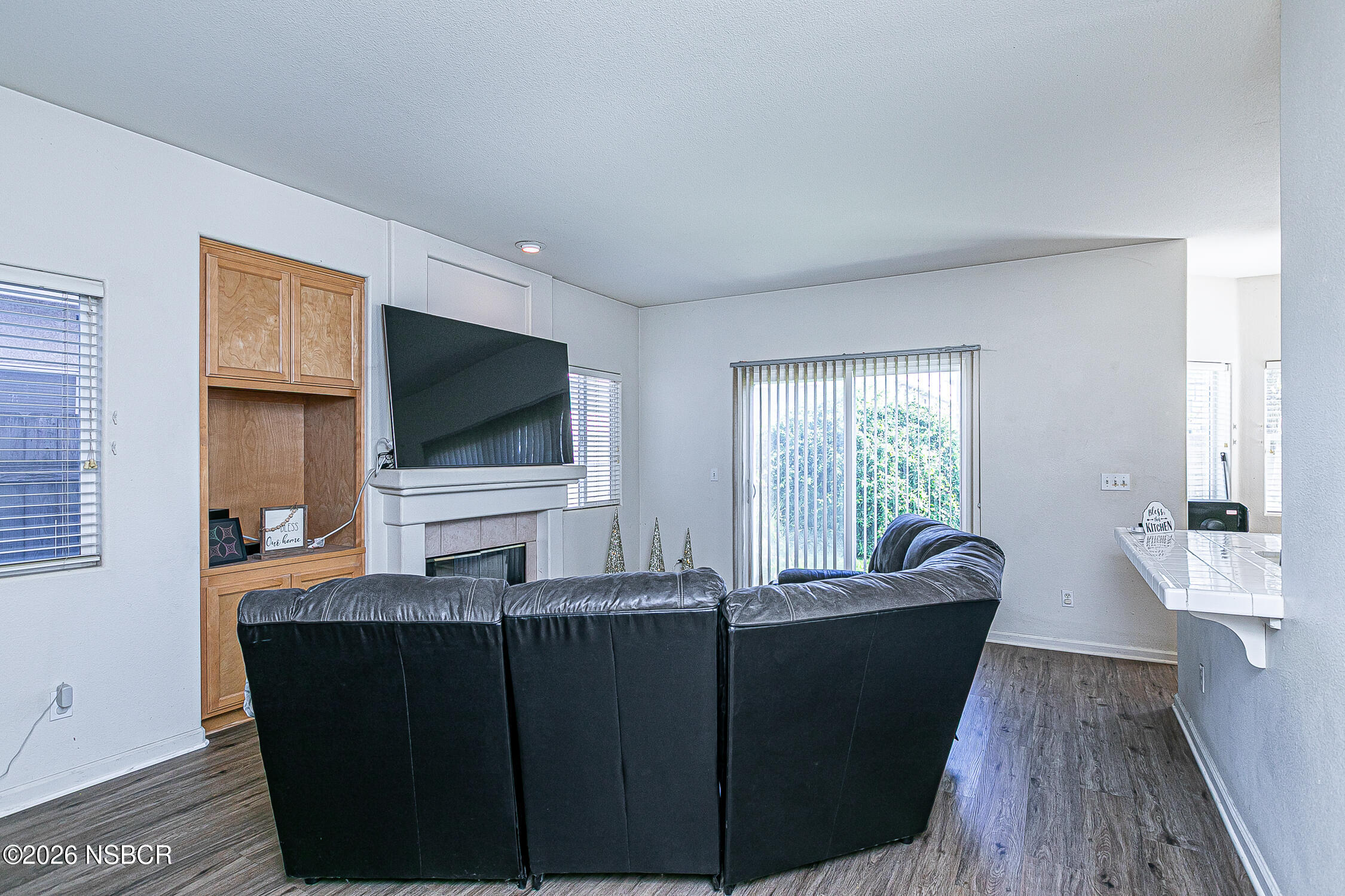 1838 Gable Lane Santa Maria, CA 93458 - Photo 8 of 31 a living room with furniture and a flat screen tv