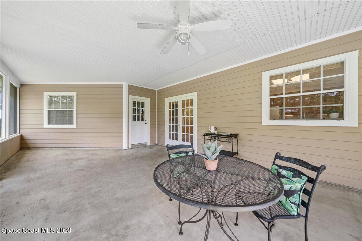 4150 Windover Way Melbourne, FL 32934 - Photo 18 of 57 a view of a livingroom with furniture and windows