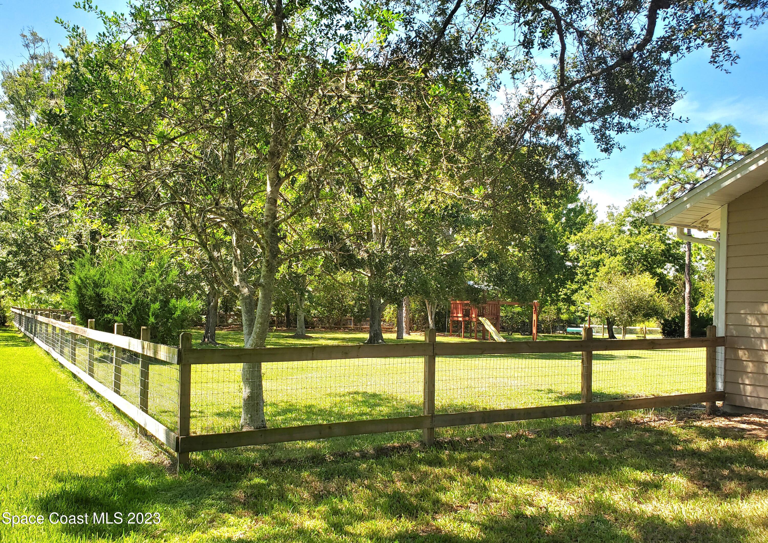 4150 Windover Way Melbourne, FL 32934 - Photo 21 of 57 Fully Fenced Backyard