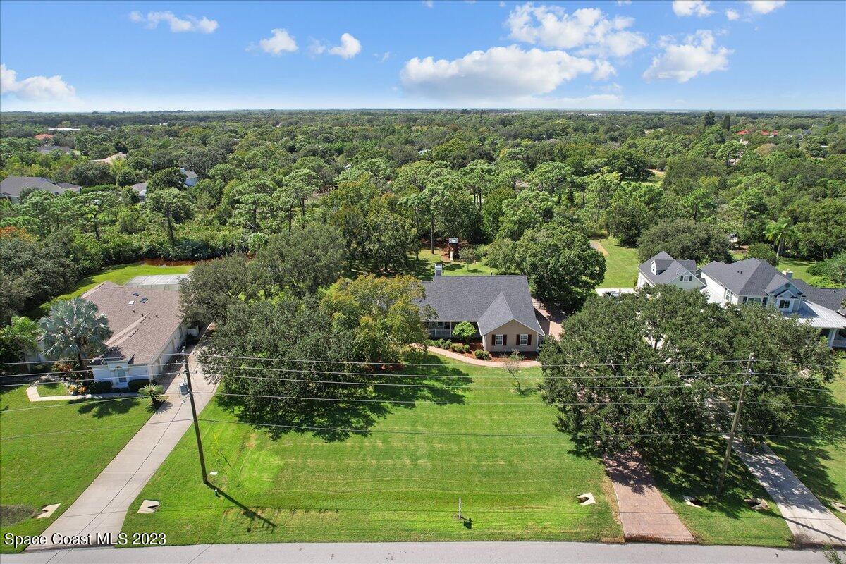 4150 Windover Way Melbourne, FL 32934 - Photo 41 of 57 aerial view of a house with a yard