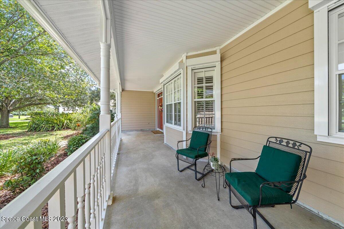 4150 Windover Way Melbourne, FL 32934 - Photo 53 of 57 a view of a chair and tables in the balcony