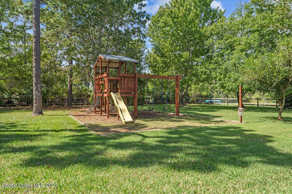 4150 Windover Way Melbourne, FL 32934 - Photo 55 of 57 a view of a park with a slide