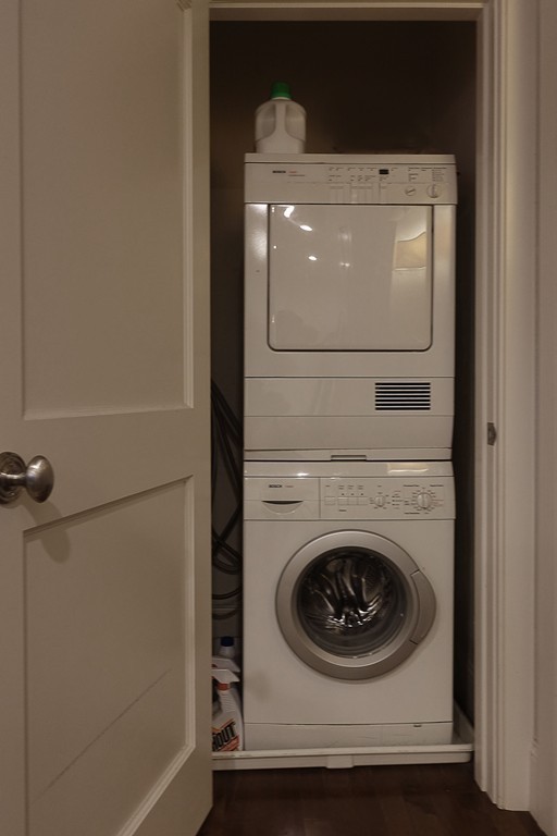 116 Rantoul Street, Unit 210 Beverly, MA 01915 - Photo 16 of 16 a utility room with dryer and washer