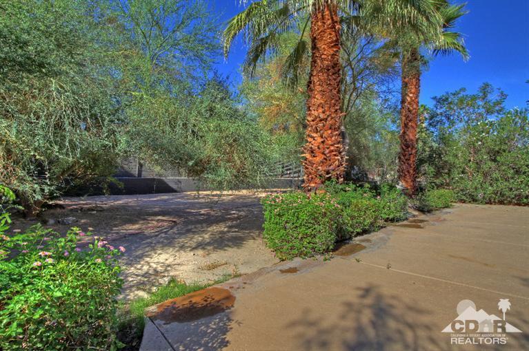 71523 Sahara Road Rancho Mirage, CA 92270 - Photo 26 of 30 a view of a yard with plants and trees