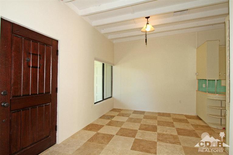 71523 Sahara Road Rancho Mirage, CA 92270 - Photo 6 of 30 a view of empty room with windows