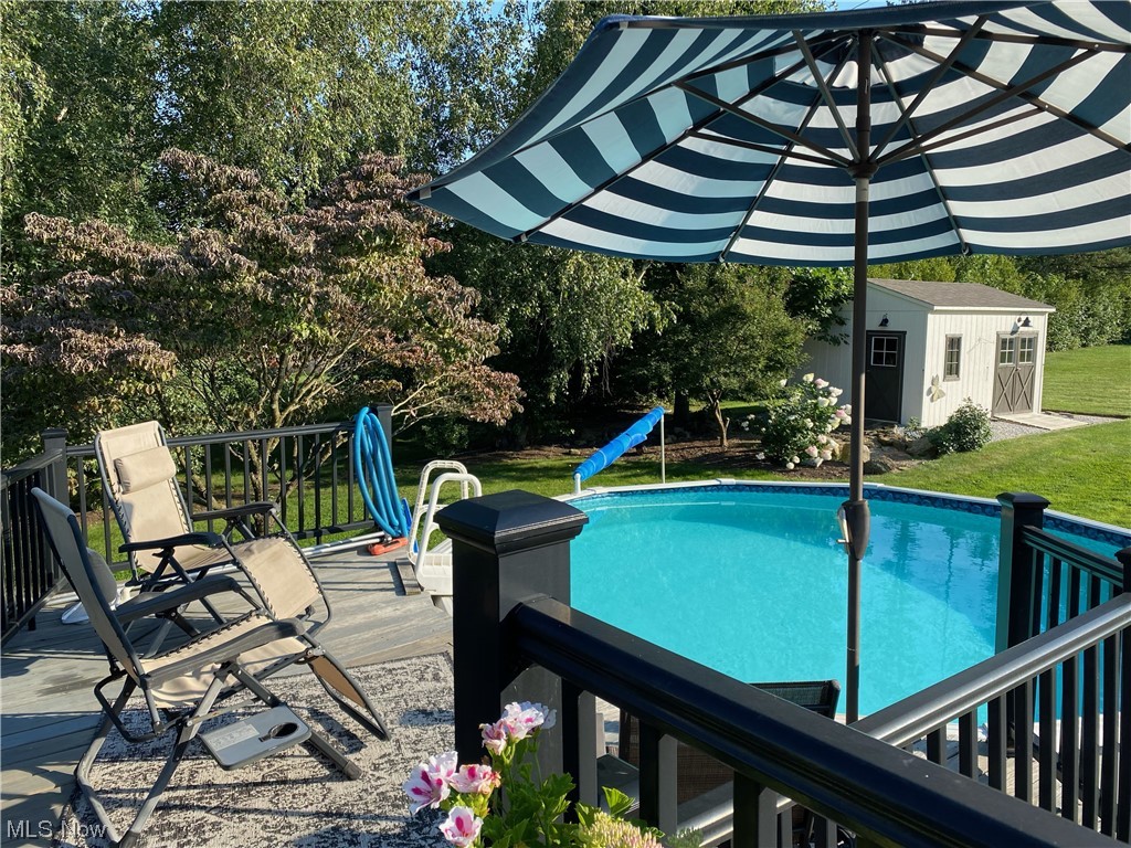 5304 Sibila Road Northwest Canton, OH 44718 - Photo 10 of 29 View of swimming pool with an outdoor structure