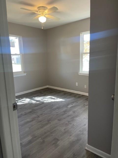 12435 Oberlin Drive Dallas, TX 75243 - Photo 12 of 19 en empty room with window and hardwood floor