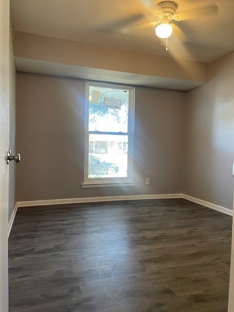 12435 Oberlin Drive Dallas, TX 75243 - Photo 14 of 19 a view of an empty room with wooden floor and a window