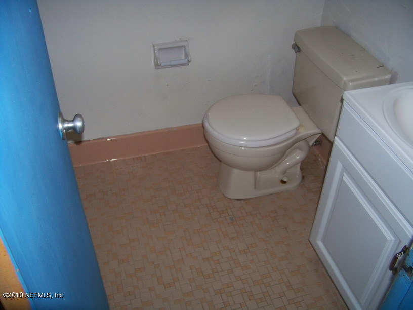 7016 Tampico Road Jacksonville, FL 32244 - Photo 3 of 4 a view of bathroom with a toilet