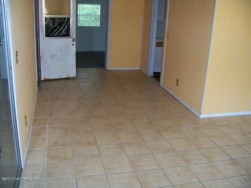 7016 Tampico Road Jacksonville, FL 32244 - Photo 4 of 4 a view of a utility room with windows
