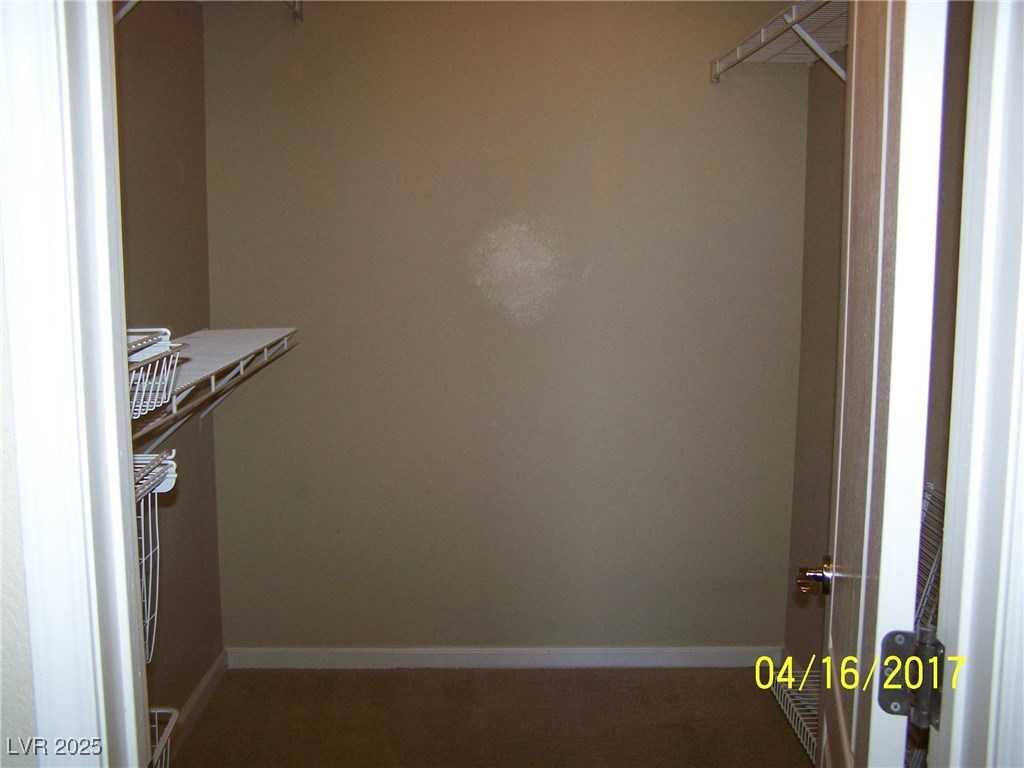 10245 King Henry Avenue, Unit 202 Las Vegas, NV 89144 - Photo 26 of 30 master bedroom...2 separate walk-in closets