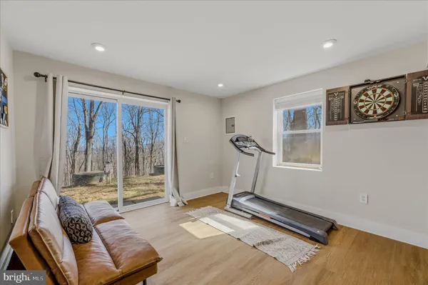 a living room with furniture and a table