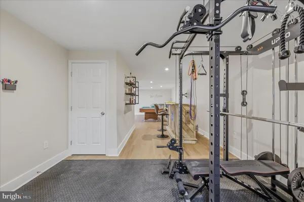 a bathroom with a toilet a sink and shower