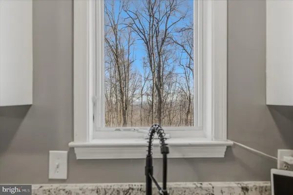 a view of wooden bench in a living room
