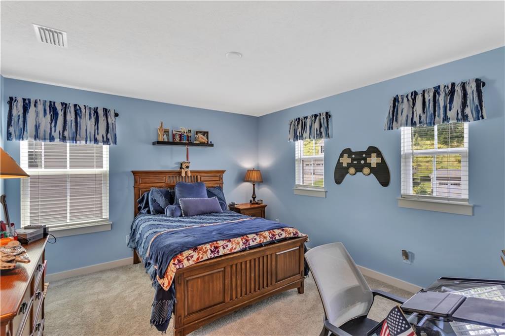 205 Regency Drive Eighty Four, PA 15330 - Photo 18 of 43 a bedroom with a bed and window