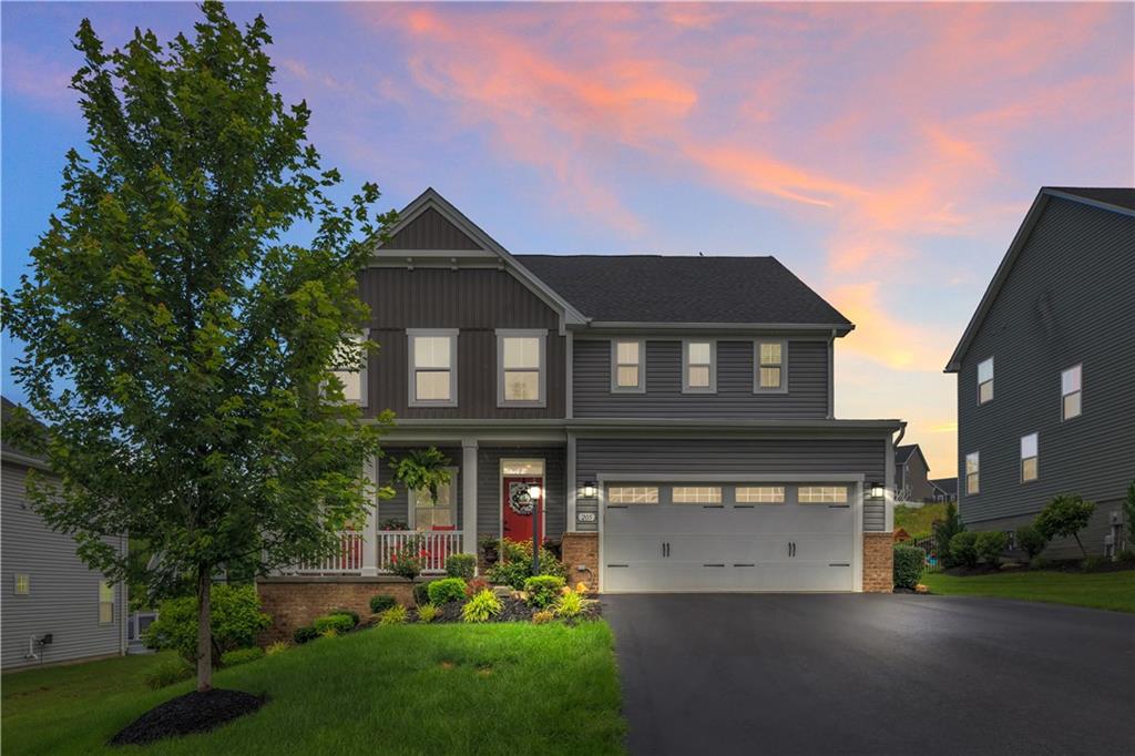 205 Regency Drive Eighty Four, PA 15330 - Photo 2 of 43 a front view of a house with a yard and fountain