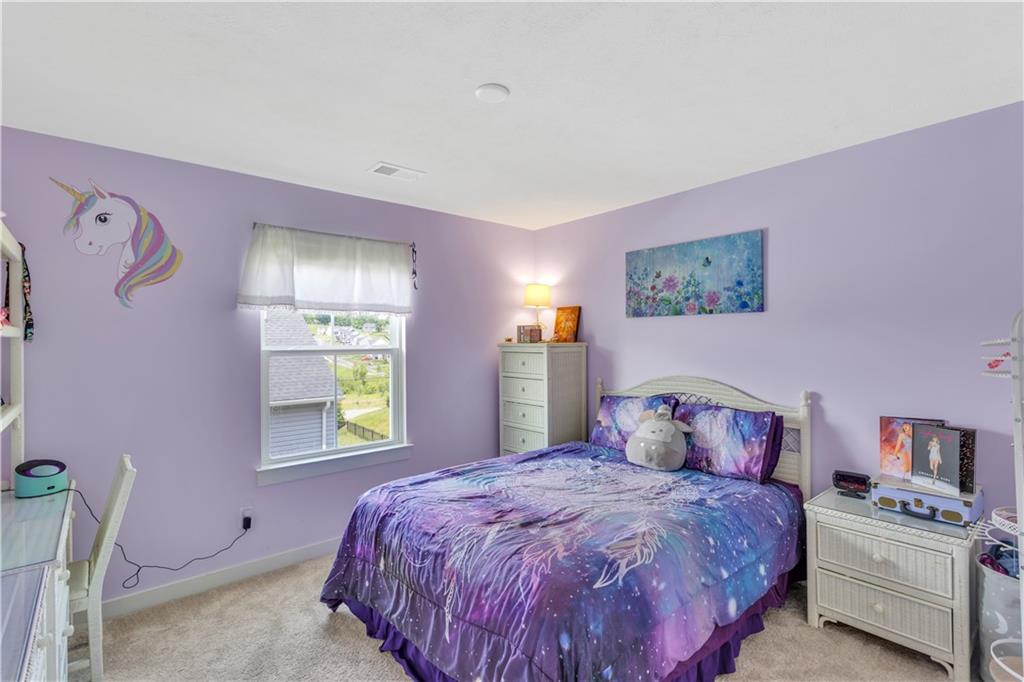 205 Regency Drive Eighty Four, PA 15330 - Photo 21 of 43 a bedroom with a bed and a window