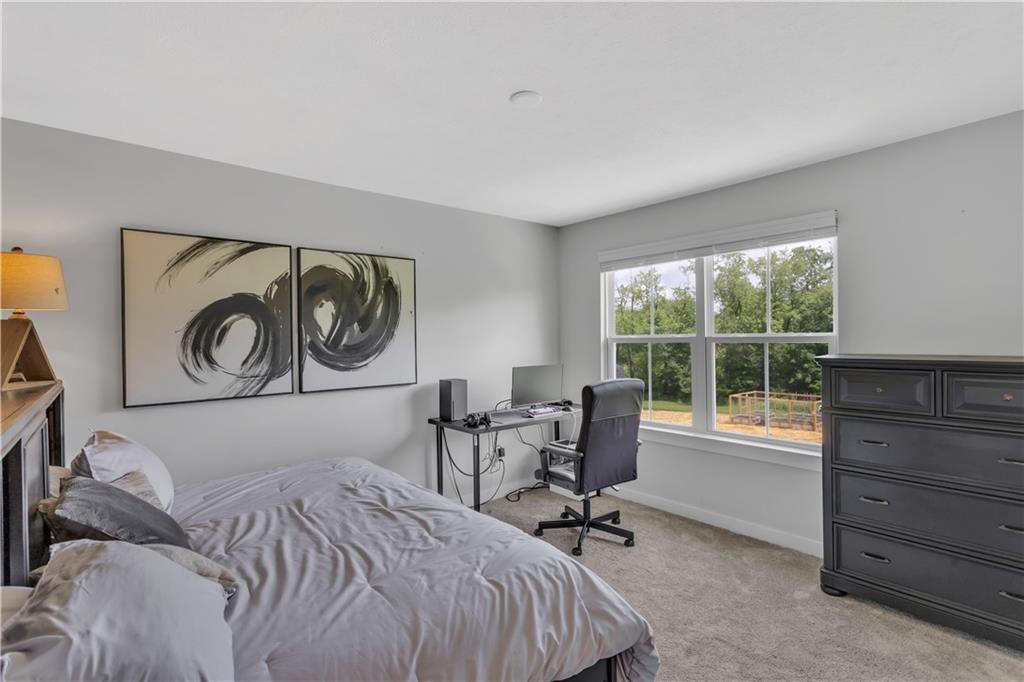 205 Regency Drive Eighty Four, PA 15330 - Photo 23 of 43 a bedroom with a bed and a window