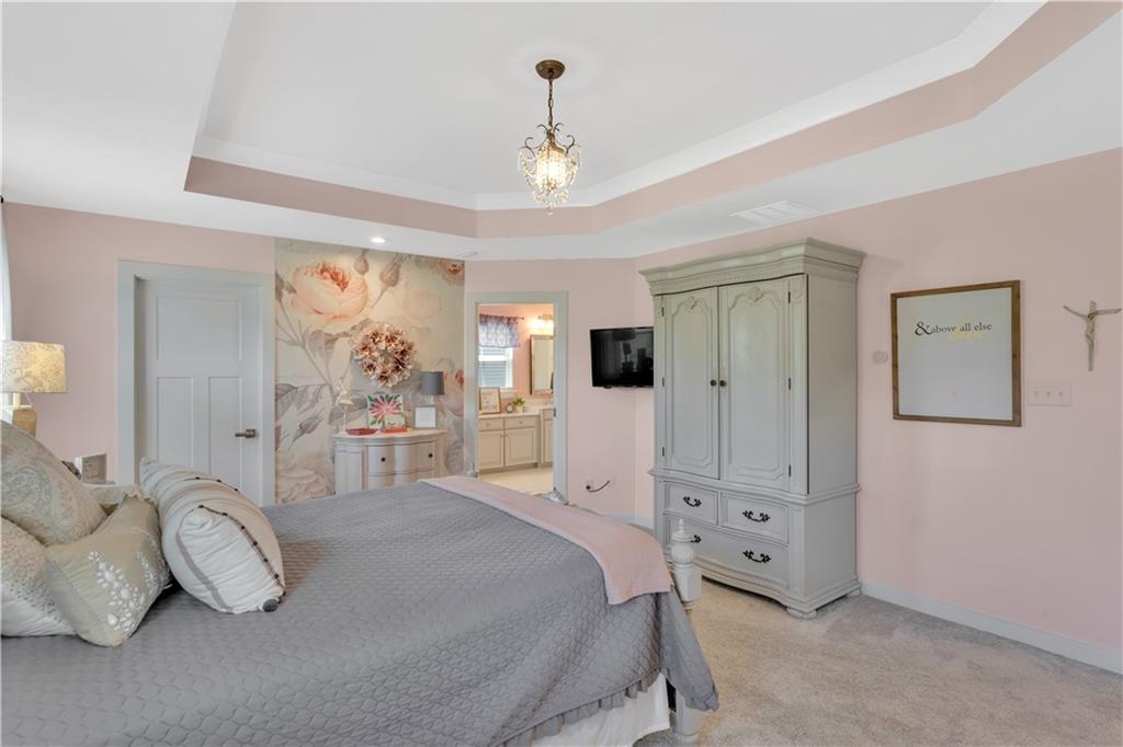 205 Regency Drive Eighty Four, PA 15330 - Photo 25 of 43 a bedroom with a bed and white cabinets