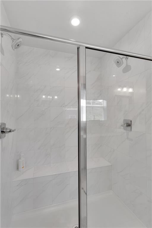 205 Regency Drive Eighty Four, PA 15330 - Photo 26 of 43 a bathroom with a glass shower door