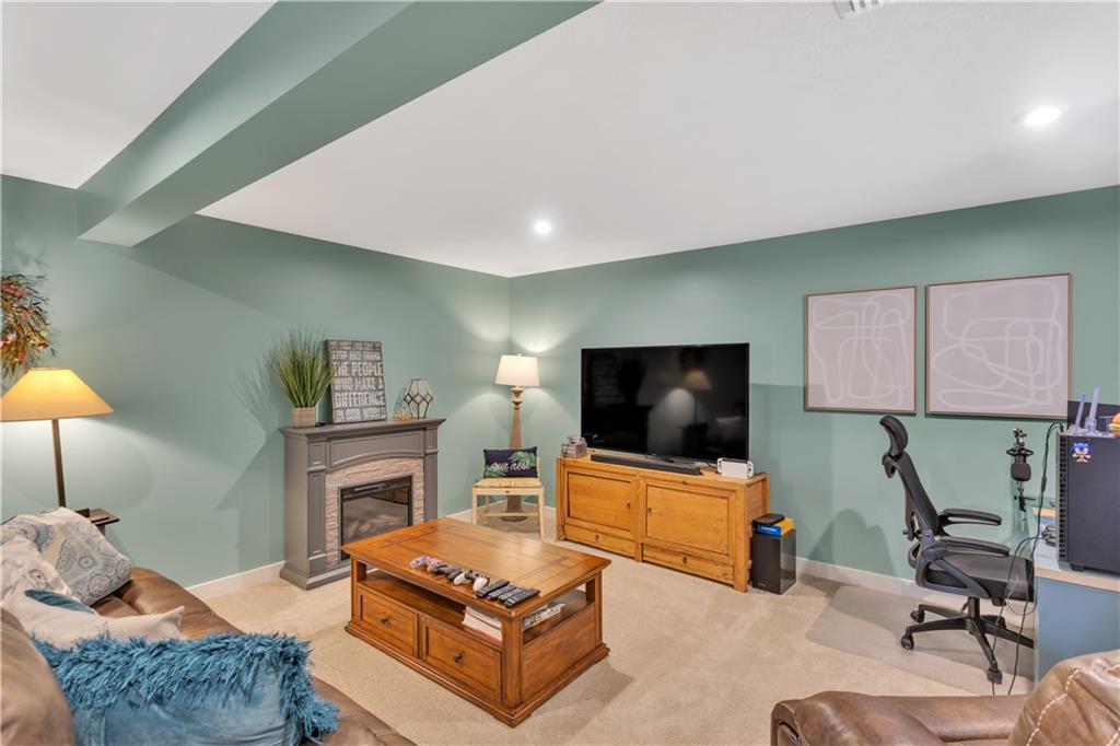205 Regency Drive Eighty Four, PA 15330 - Photo 30 of 43 a living room with furniture and a flat screen tv