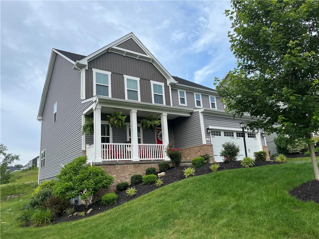 205 Regency Drive Eighty Four, PA 15330 - Photo 3 of 43 a front view of a house with a yard