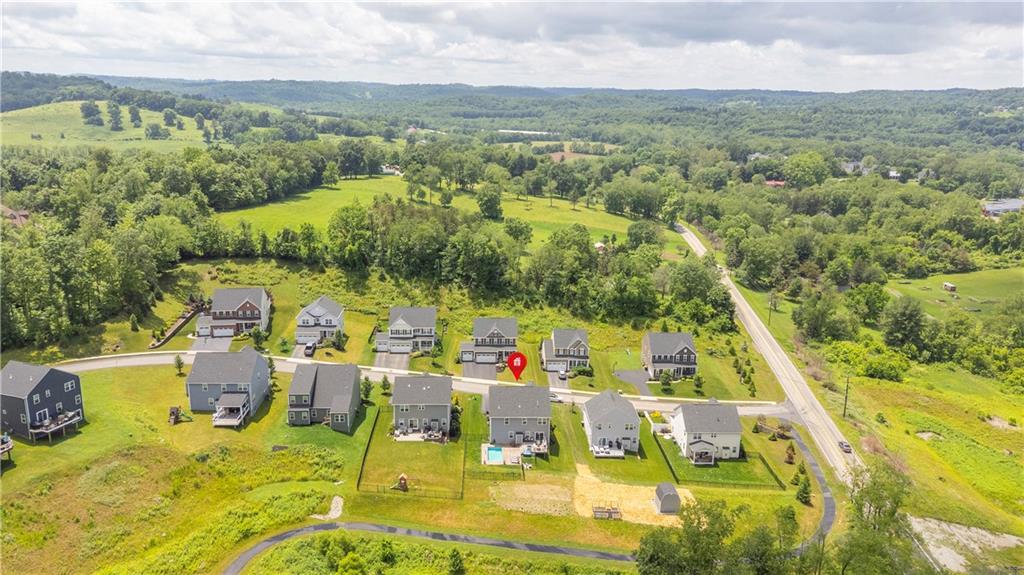 205 Regency Drive Eighty Four, PA 15330 - Photo 40 of 43 a view of a swimming pool with a patio