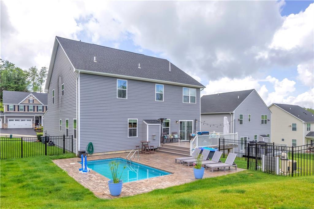 205 Regency Drive Eighty Four, PA 15330 - Photo 4 of 43 a view of a house with swimming pool and sitting area