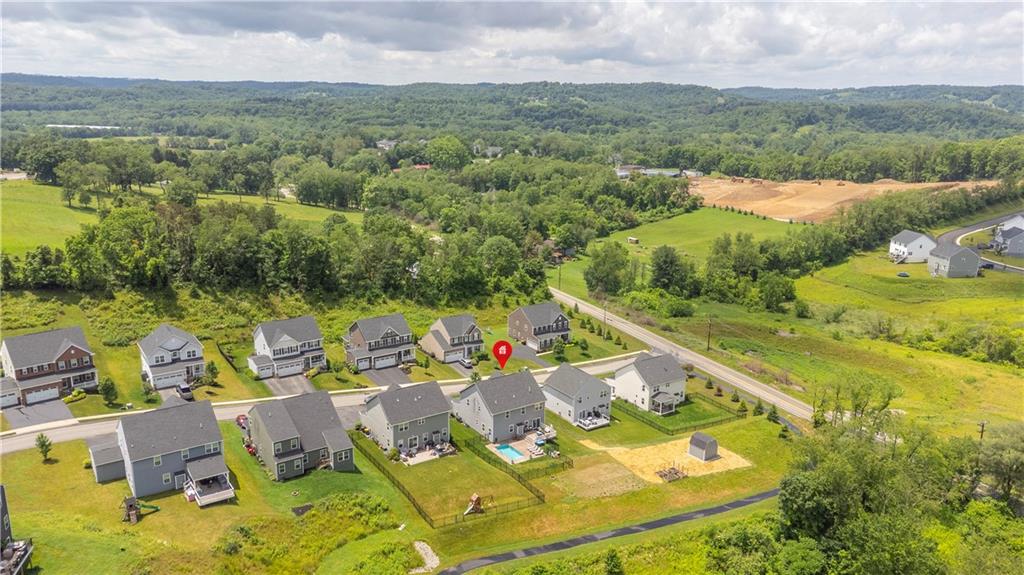 205 Regency Drive Eighty Four, PA 15330 - Photo 41 of 43 an aerial view of a house with pool lake view and mountain view