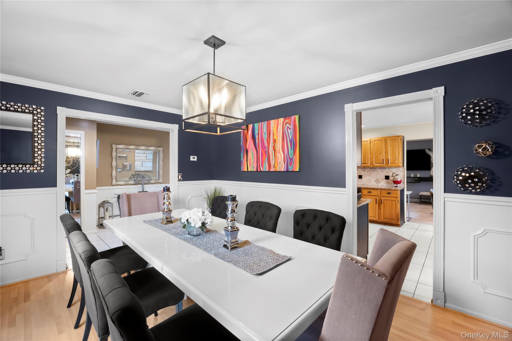 19 Jacob Road Plainview, NY 11803 - Photo 6 of 33 a view of a dining room with furniture and wooden floor
