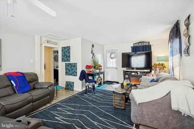 a bed room with a bed and a fish tank