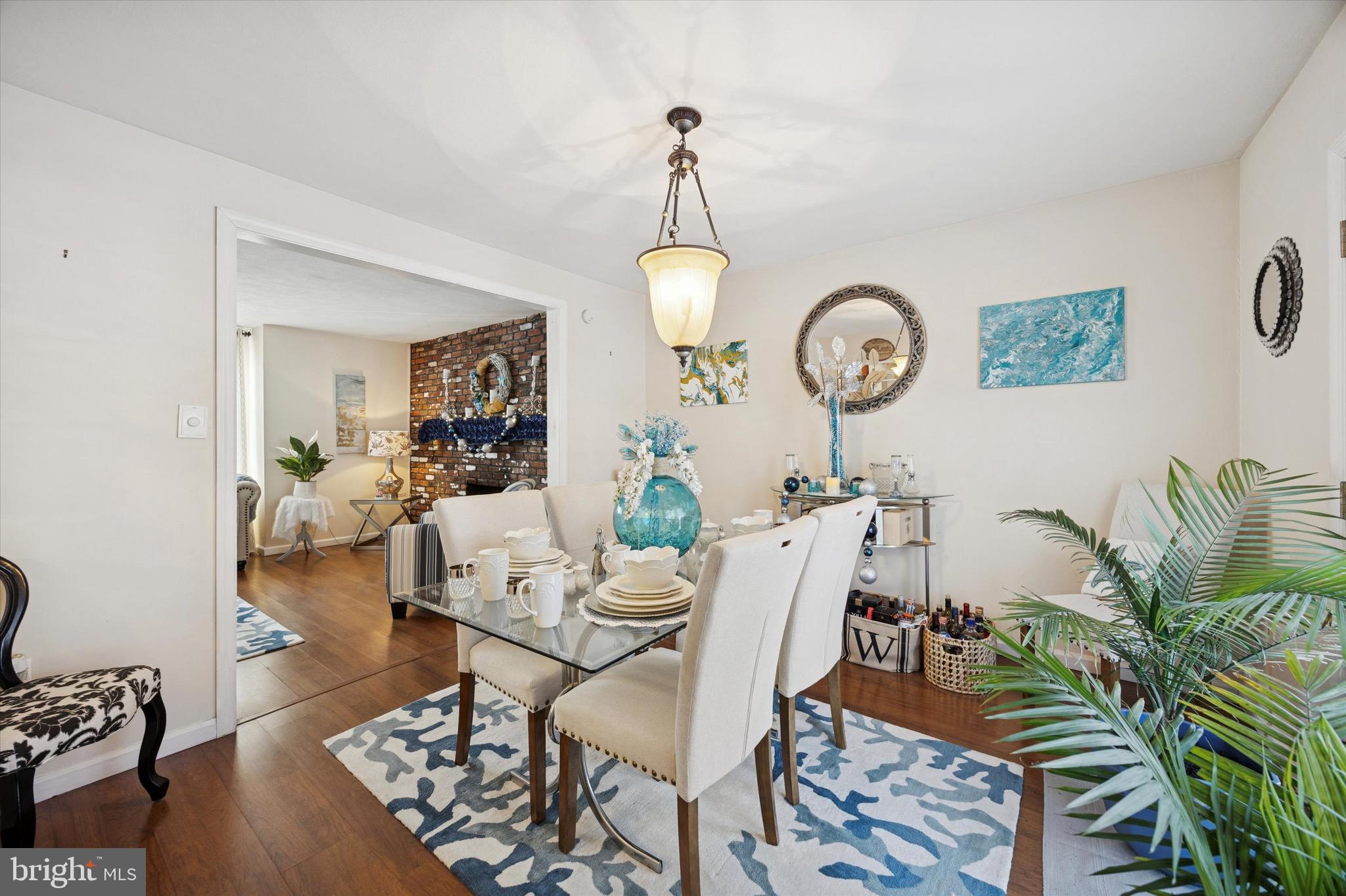2608 Erial Road Blackwood, NJ 08012 - Photo 8 of 24 a view of a dining room with furniture wooden floor and a chandelier