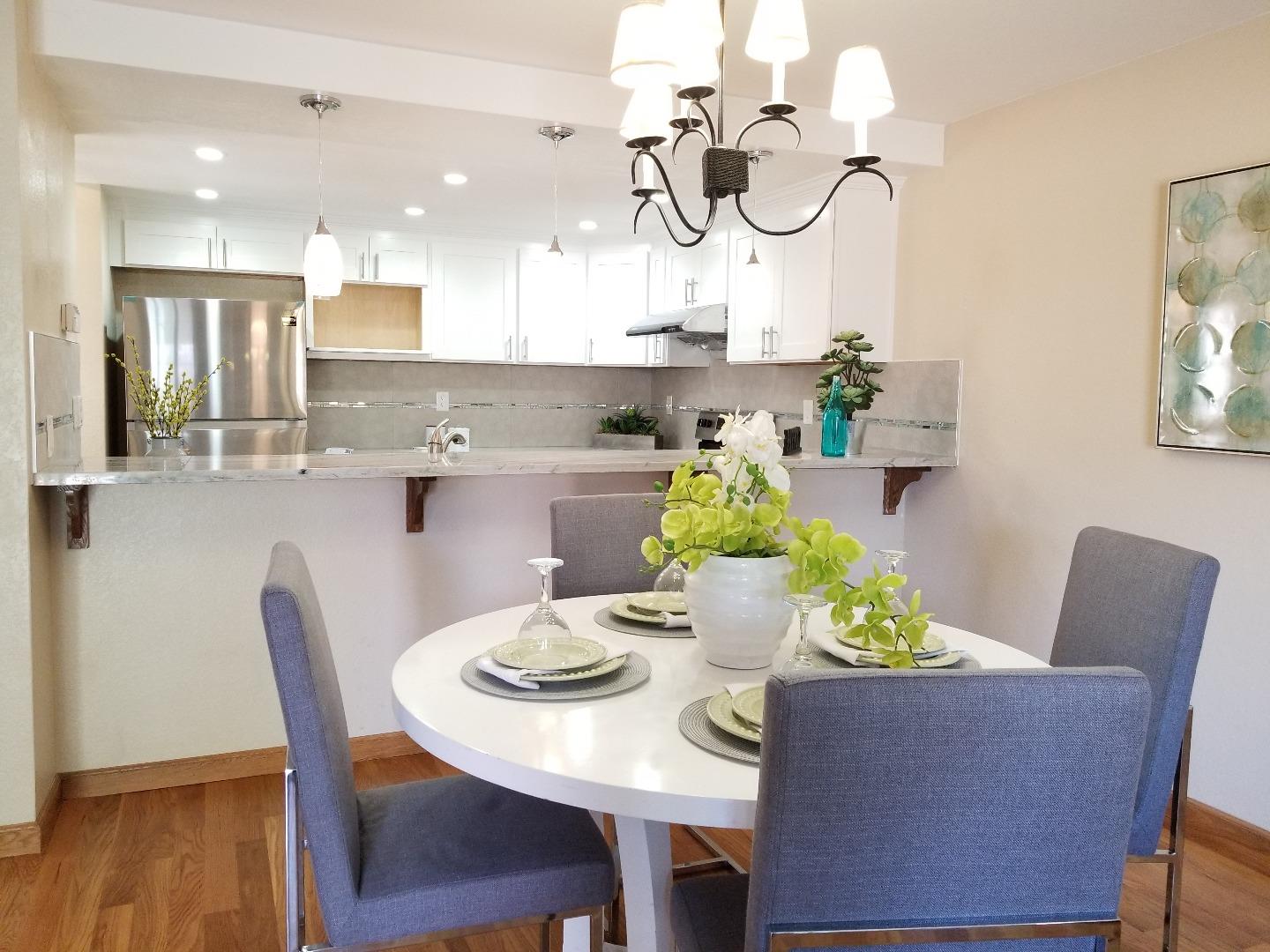 161 Redding Road Campbell, CA 95008 - Photo 7 of 21 a dining room filled chandelier and wooden floor